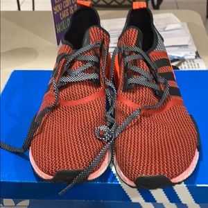 One pair of Adidas sneakers